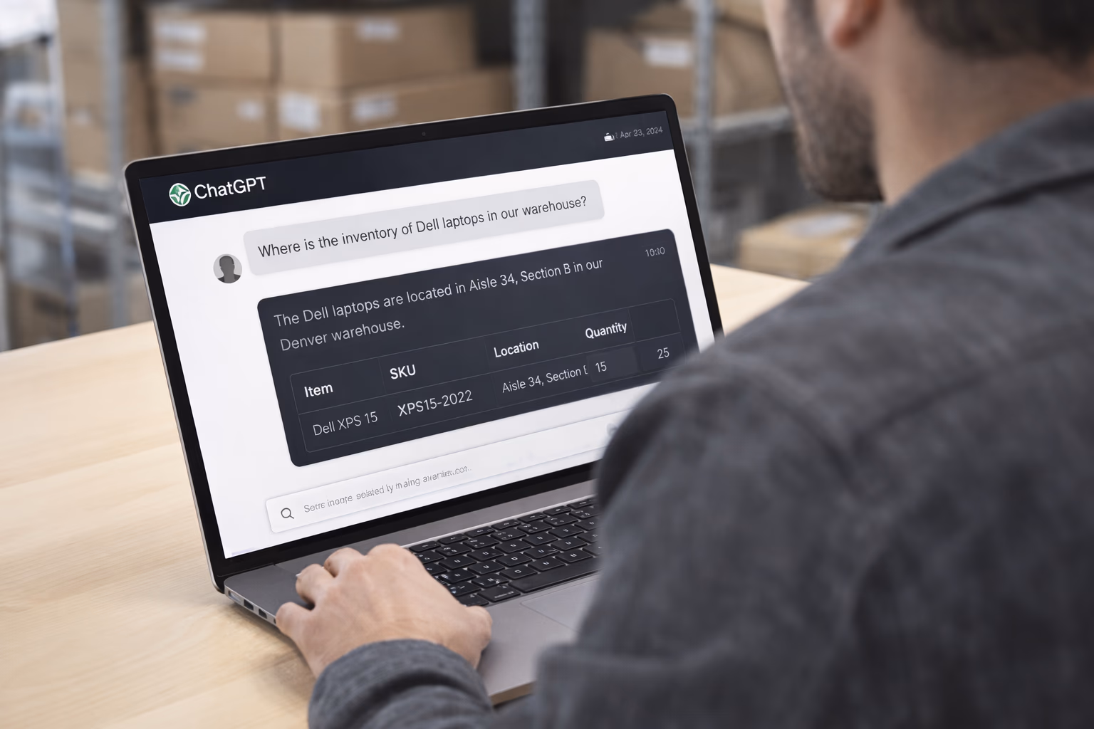 Operations team member running AI-assisted inventory queries on laptop